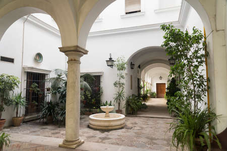Sevilla (Andalucia, Spain): courtyard (patio) of historic palace near the cathedralのeditorial素材