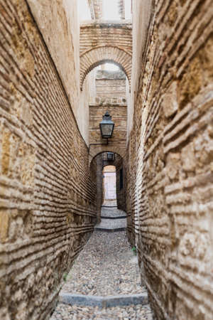 Cordoba (Andalucia, Spain): old typical alley in the Juderiaの写真素材