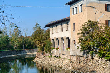 Country house along the Naviglio Grande of Turbigo (Milan, Lombardy, Italy) at fallの写真素材