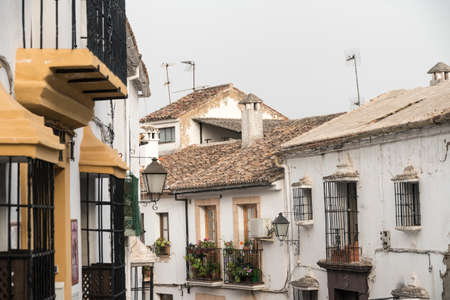 Ronda (Andalucia, Spain): old typical street with white housesの写真素材