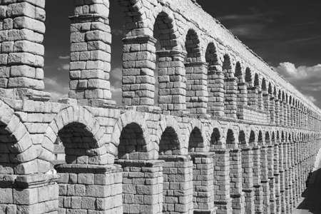 Segovia (Castilla y Leon, Spain): the Roman aqueduct, Unesco World Heritage Site. Black and whiteの写真素材
