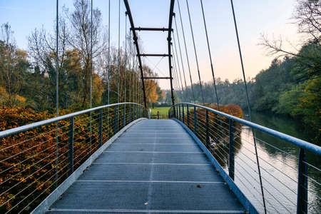 Pedestrian and bicycle track along the Lambro river Monza Brianza, Lombardy, Italy) at fall. Bridgeのeditorial素材