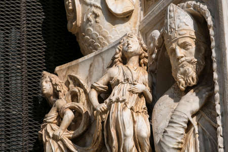 Facade of the historic Certosa di Pavia (Lombardy, Italy), medieval monument. Statuesのeditorial素材