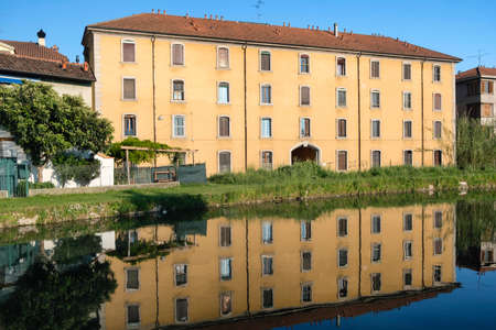 Cycling lane along the Naviglio Pavese, from Pavia to Milan (Lombardy, Italy) in the springtime. Buildingsの写真素材