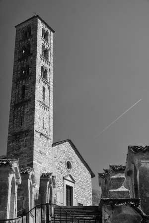 Lasnigo (Como, Lombardy, Italy): the medieval church of Sant'Alessandro, built from the 12th century along the road to Madonna del Ghisallo. Black and whiteの写真素材