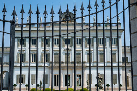 Cassano d'Adda (Milan, Lombardy, Italy): exterior of the historic Villa Borromeo and the park through the gateのeditorial素材