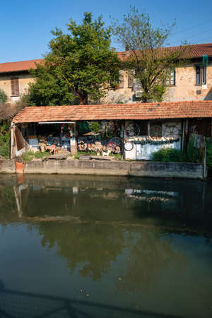 Milan (Lombardy, Italy): the canal of Martesana with historic house reflected in the waterのeditorial素材