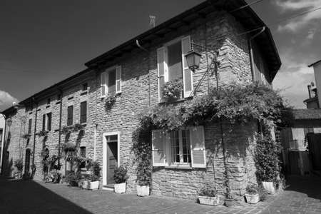 Nibbiano (Piacenza, Emilia-Romagna, Italy): old typical house exterior with plants and flowers....