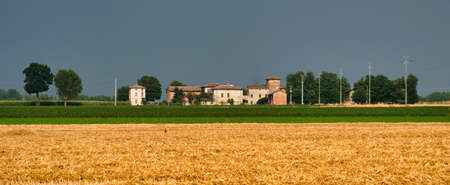 Country landscape along the road from Vigolo Marchese to Fiorenzuola d'Arda (Piacenza, Emilia Romagna, Italy) at summerのeditorial素材