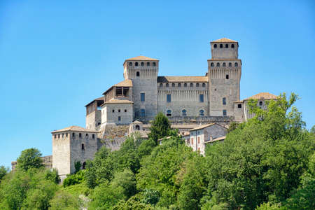 The medieval castle of Torrechiara (Parma, Emilia Romagna, Italy) at summerの写真素材