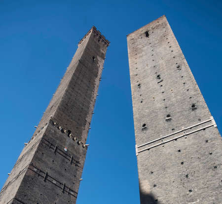 Bologna (Emilia Romagna, Italy): the two medieval towers, Garisenda and degli Asinelliの写真素材