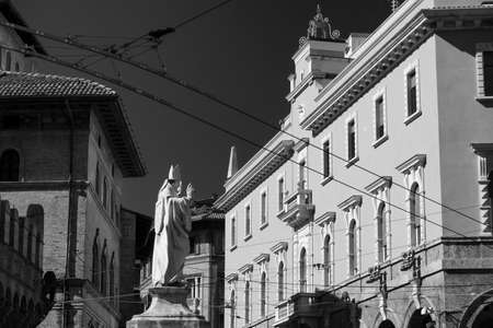 Bologna (Emilia Romagna, Italy): historic buildings in a sunny morning. Black and whiteの写真素材