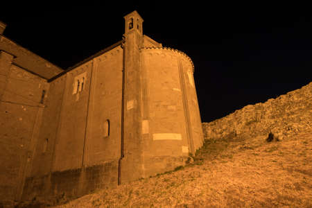 Sunset at San Leo (Forli Cesena, Emilia Romagna, Italy): the historic town at evening, churchの写真素材