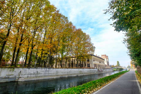 Bicycle path along the Naviglio Grande from Abbiategrasso to Turbigo (Lombardy, Italy), at Robecco sul Naviglio: Villa Gaia and Palazzo Archinto at fallの写真素材
