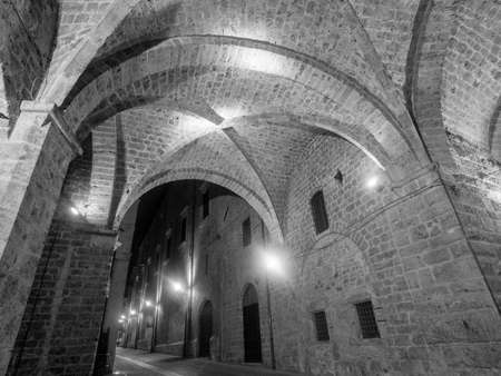 Rieti (Lazio, Italy): historic buildings near the cathedral at evening. Black and whiteのeditorial素材