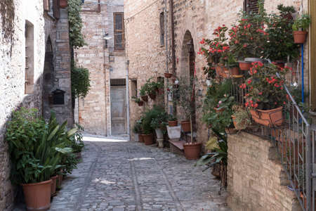 Historic buildings of Spello, medieval city (Perugia, Umbria, Italy). Alleyのeditorial素材
