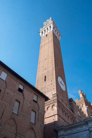 Historic buildings in Piazza del Campo in SIena, Tuscany, Italy, the famous square hosting the Palio, at morningのeditorial素材