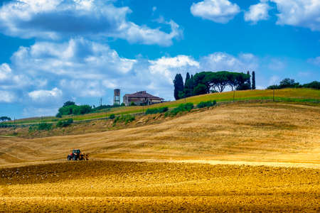 Rural landscape at summer along the road from Volterra to Ponsacco, Tuscany, Italyの写真素材