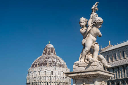 Pisa, Tuscany, Italy: the famous Piazza dei Miracoli, with the cathedral, the baptistery and the leaning towerの写真素材