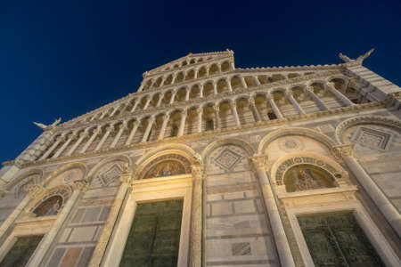 Pisa, Tuscany, Italy: the famous Piazza dei Miracoli, with the cathedral, the baptistery and the leaning tower at eveningの写真素材