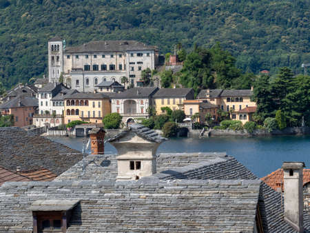 Orta San Giulio, Verbano Cusio Ossola, Piedmont, Italy: cityscape with the lake at summerの写真素材