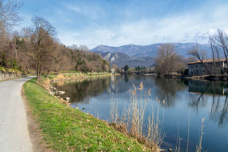Cycleway along the Adda river near Imbersago and Brivio (Lombardy, Italy) at winterの写真素材