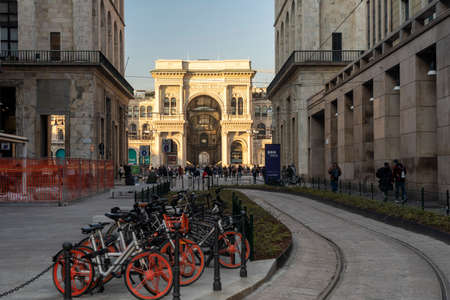 Milan, Lombardy, Italy: rental bicycles near the historic piazza Duomo, the main square of the city
