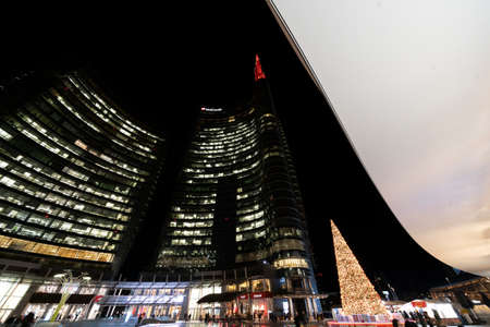 Milan, Lombardy, Italy: modern buildings in the new Gae Aulenti square by night at Christmasのeditorial素材