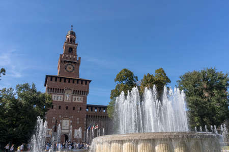 Milan, Lombardy, Italy: Filarete tower of the medieval castle known as Castello Sforzesco, and the fountainのeditorial素材
