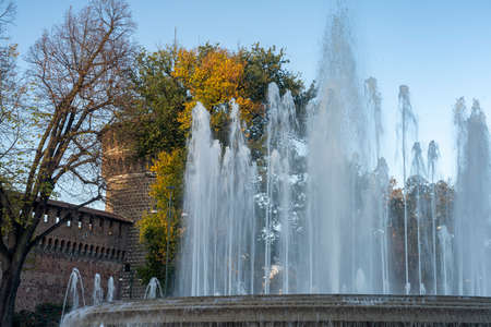 Milan, Lombardy, Italy: historic fountain in the square of the castle known as Castello Sforzescoのeditorial素材