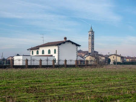 Rural landscape in the province of Lodi, Lombardy, Italy, at winter (December). A village.のeditorial素材