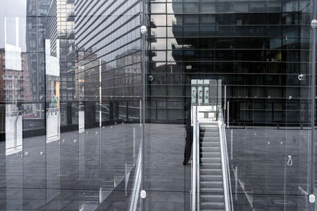 Milan, Lombardy, Italy: modern buildings in Alvar Aalto square. Reflections