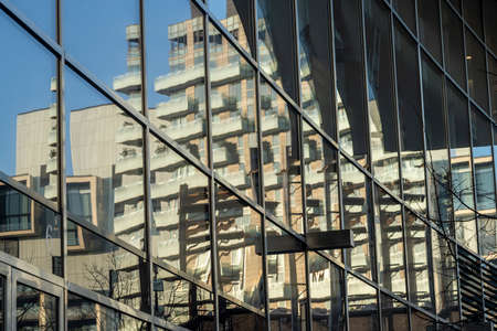Milan, Lombardy, Italy: modern buildings in Alvar Aalto square. Reflectionsのeditorial素材