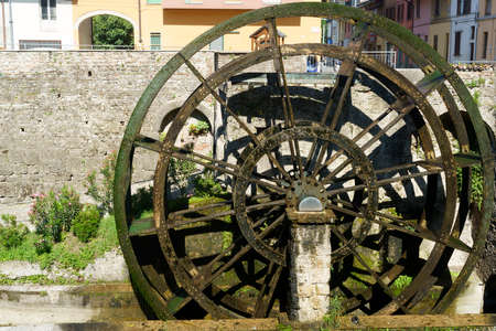 Groppello (Milan, Lombardy, Italy): the big wooden wheel on the Martesana canal known as Rudun and...