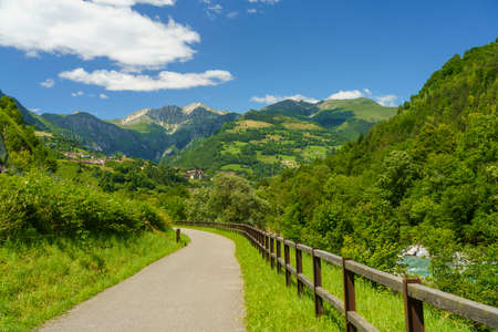 Serio river along the cycleway of Val Seriana, Lombardy, Italy, at Ponte Nossa in the summertimeの写真素材