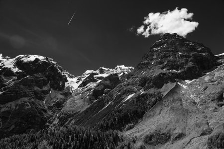 Mountain landscape along the road to Stelvio pass, Bolzano province, Trentino-Alto Adige, Italy, at summer. Glacier. Black and whiteの写真素材