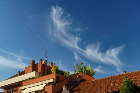 Milan, Lombardy, Italy: strange clouds at summer seen from via Piero della Francescaの写真素材