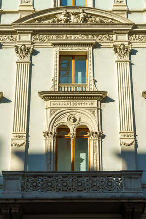 Milan, Lombardy, Italy: facade of historic palace along via Danteのeditorial素材