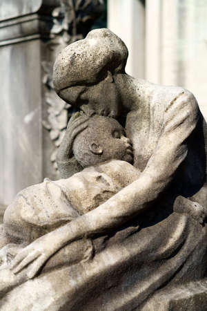 Milan, Lombardy, Italy: historic cemetery known as Cimitero Monumentale: a tomb with sculptureの写真素材