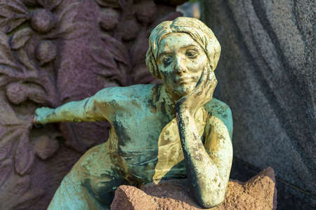 Milan, Lombardy, Italy: historic cemetery known as Cimitero Monumentale: a tomb with statueの写真素材