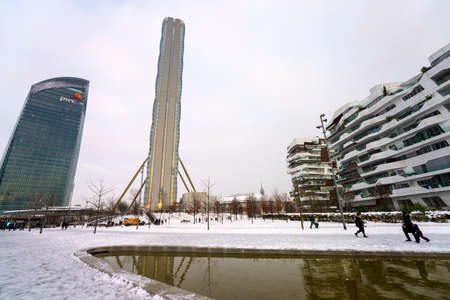 Milan, Italy: modern Citylife park, Isozaki, Hadid and Libeskind buildings with snowのeditorial素材