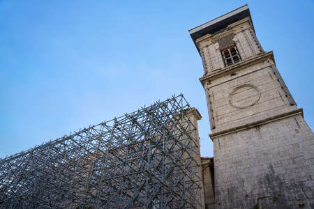 Norcia, Perugia province, Umbria, Italy: exterior of the historic San Benedetto church (basilica) destroyed by the earthquakeの写真素材
