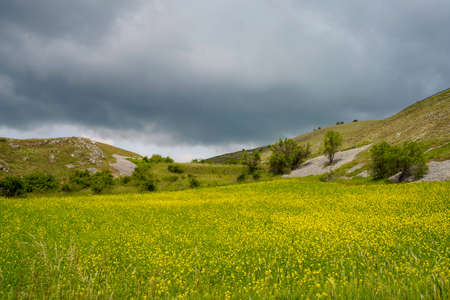 Mountain landscape at Gran Sasso Natural Park, in Abruzzo, Italy, L Aquila province, at springtime (June)の写真素材
