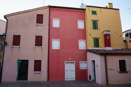 Typical colorful houses of Caorle, in Venice province, Veneto, Italyの写真素材