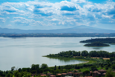 The Trasimeno lake at summer near Passignano, in Perugia province, Umbria, Italyの写真素材