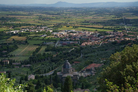 Panoramic view from Cortona, in the Arezzo province, Tuscany, Italy, at summer. Santa Maria delle Grazie al Calcinaioの写真素材