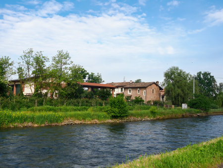 Landscape along the cycleway of Naviglio Grande, Milan province, Lombardy, Italyの写真素材