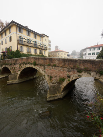 Old bridge over Lambro river in Monza, Brianza, Lombardy, Italy, between Gerardo dei Tintori and Edmondo De Amicis streetsの写真素材