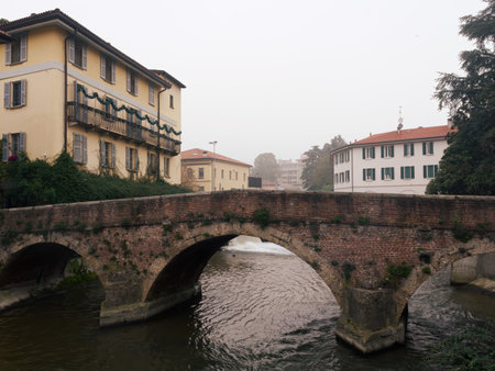 Old bridge over Lambro river in Monza, Brianza, Lombardy, Italy, between Gerardo dei Tintori and Edmondo De Amicis streetsの写真素材
