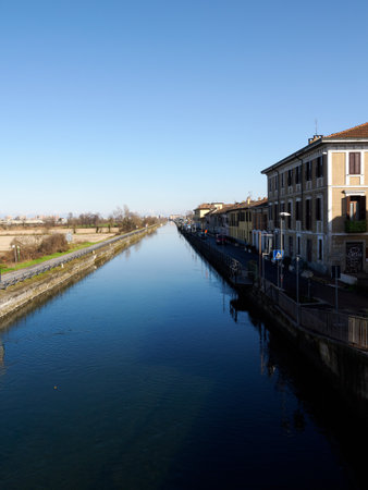 Gaggiano, historic town along the Naviglio Grande, Milan, Lombardy, Italy, with colorful houses along the canalの写真素材